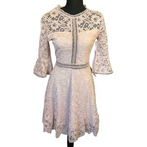 Cream fit and flare mini dress with 3/4 bell sleeves for wedding guest